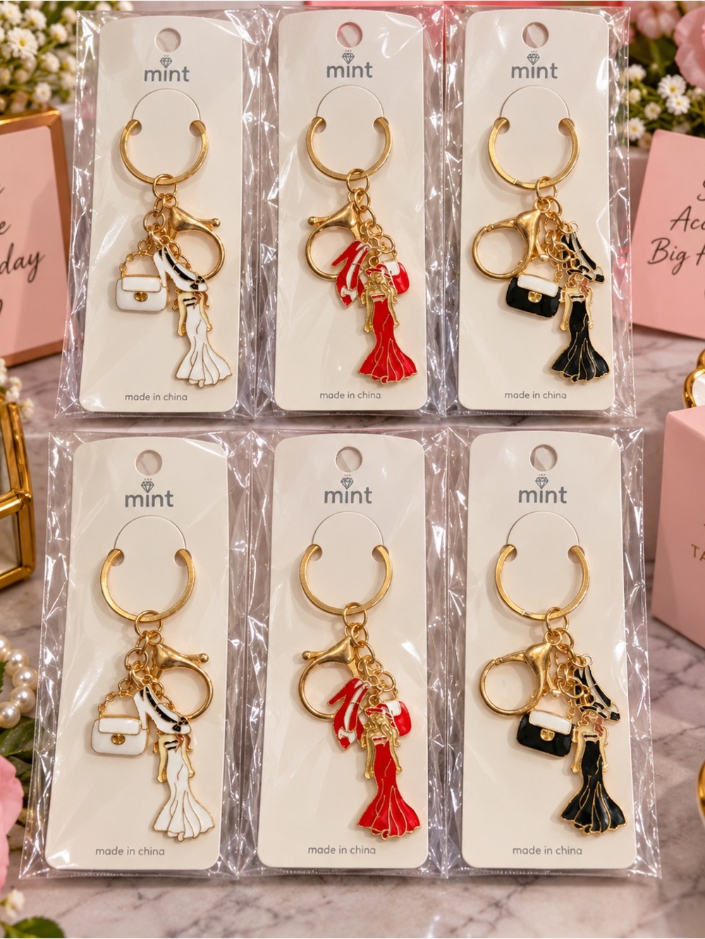 Mint Gold Keychain with White, Red, and Black Dress Charms